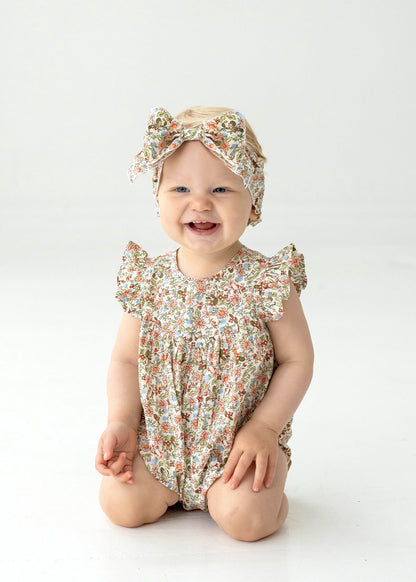 SUNSET FIELDS FLORAL ROMPER